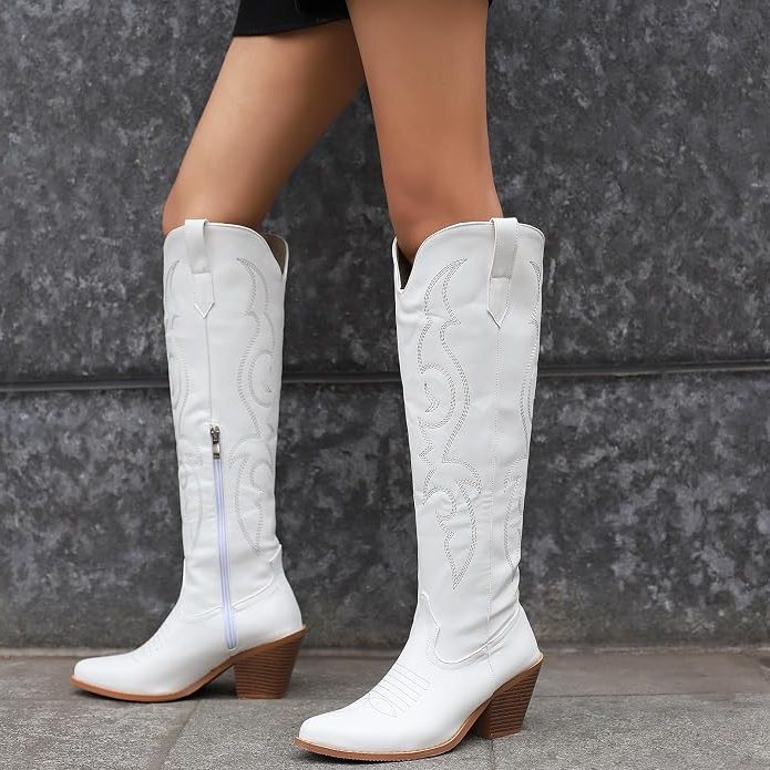 Women's white western knee-high boots worn