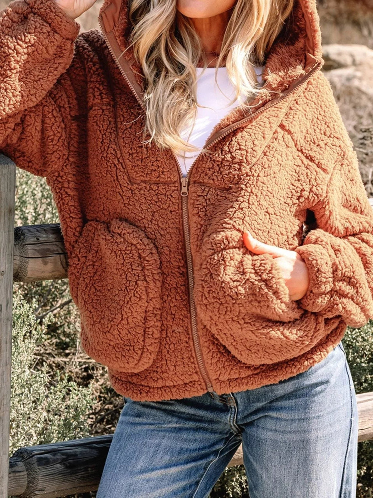 Women's brown hooded teddy jacket shown open at the front