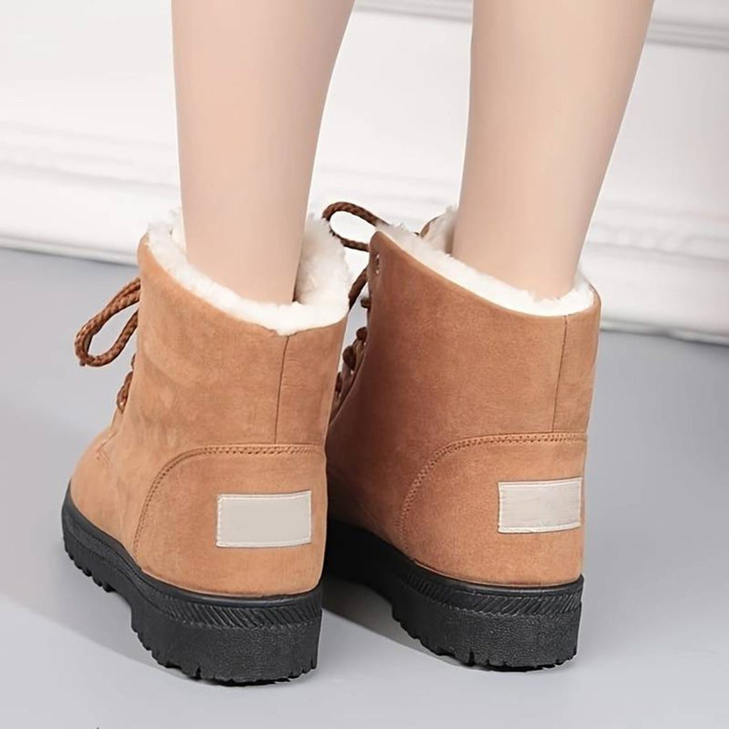 Light brown women's plush-lined lace-up ankle boots, back view