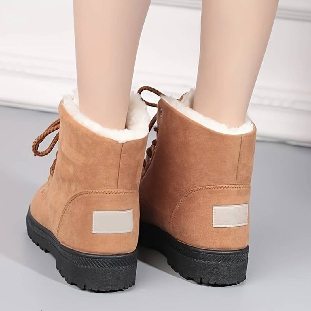 Light brown women's plush-lined lace-up ankle boots, back view