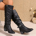 Women's black slouchy knee-high boots side view